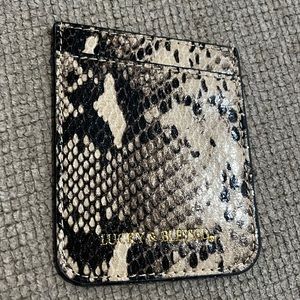 Cell phone credit card holder in snakeskin